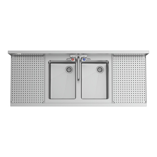 A Regency stainless steel underbar sink with (2) faucets over (2) drainboards.