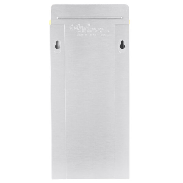 A stainless steel rectangular knife rack with a yellow insert on a counter.