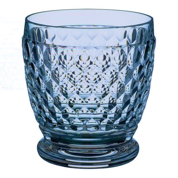 A Villeroy & Boch Boston blue rocks glass with a patterned design.
