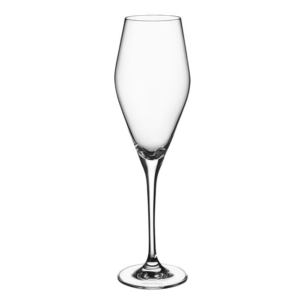 A clear wine glass with a long stem.