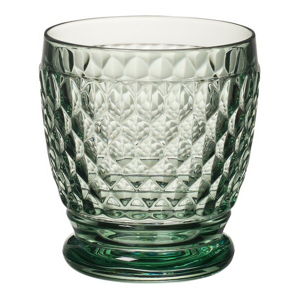 A close up of a Villeroy & Boch green diamond patterned rocks glass.