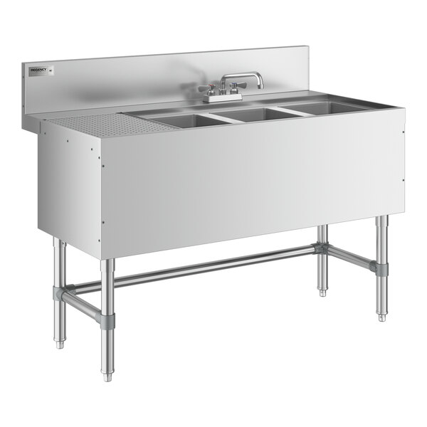 A Regency stainless steel underbar sink with three bowls and a left drainboard.