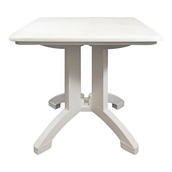 A Grosfillex white table with white legs and a white surface.