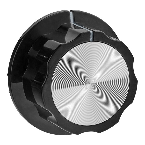 A black Estella temperature control knob with a silver top.