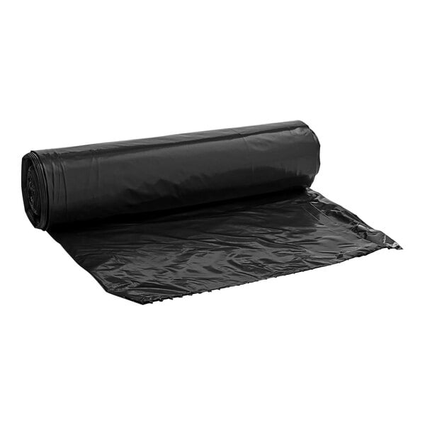 A roll of black EcoStrong Plus trash bags.