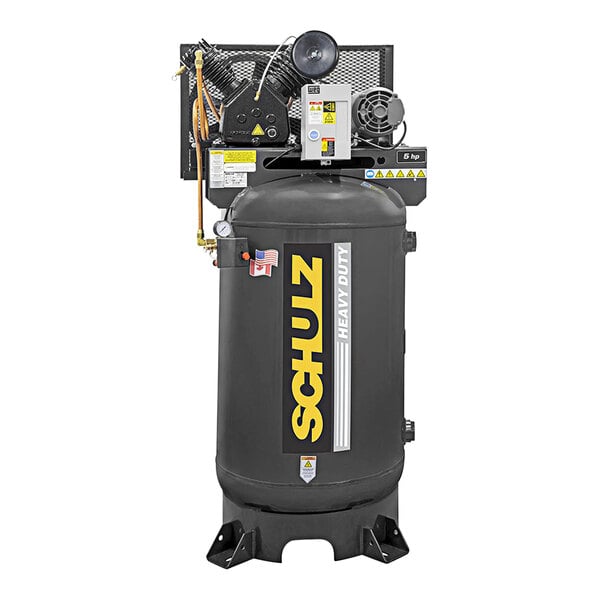 A large grey Schulz V-Series air compressor tank with yellow text.