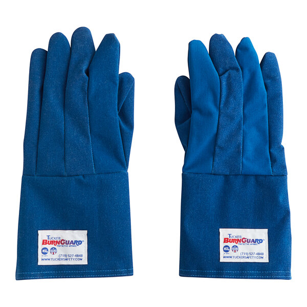 A close-up of a blue Tucker Safety Nomex glove with a white label.