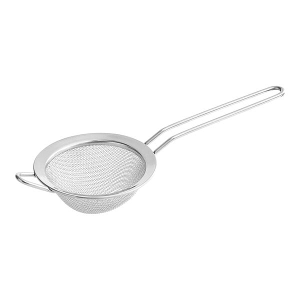 A silver Matfer Bourgeat stainless steel strainer with a handle.