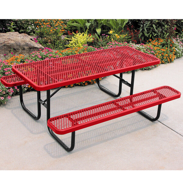 An Ultra Site red rectangular picnic table with benches on a concrete surface.