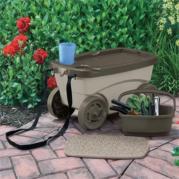A Suncast garden scooter with a bucket and a bag on it.
