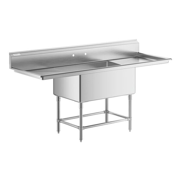 A Regency stainless steel sink with 2 drainboards.