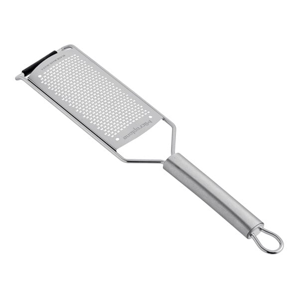A Microplane stainless steel paddle style grater with a handle.