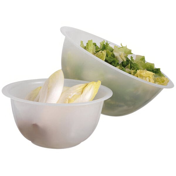A couple of Matfer Bourgeat polypropylene mixing bowls with lettuce and endive in them.