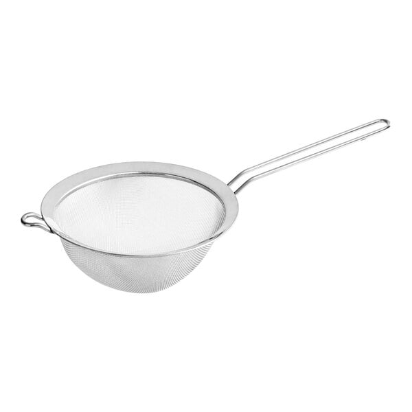 A close-up of a Matfer Bourgeat stainless steel strainer with a handle.