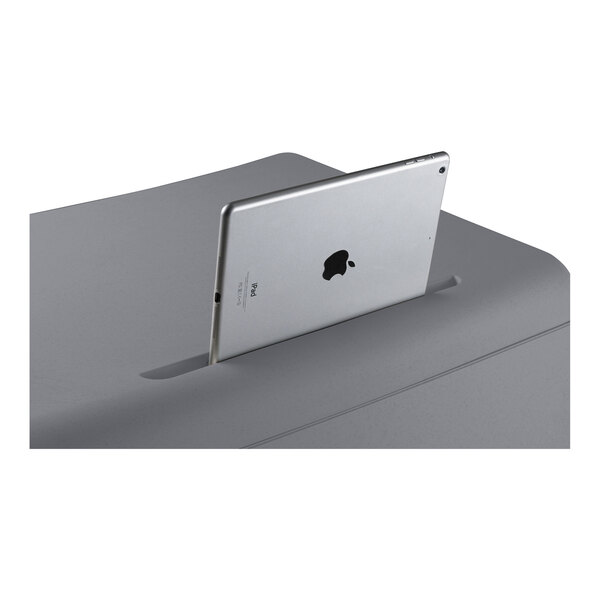 A tablet on a gray National Public Seating sit / stand desk.