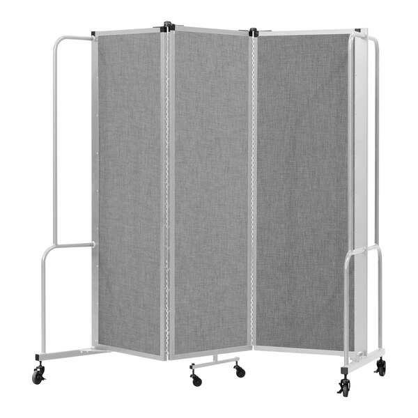 A National Public Seating gray room divider with 3 panels and wheels.