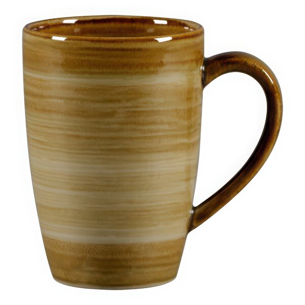 A brown and white RAK Porcelain mug with a handle.