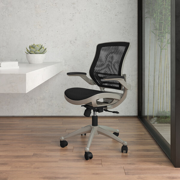 A Flash Furniture Warfield office chair with a black seat and gray back on a white background.