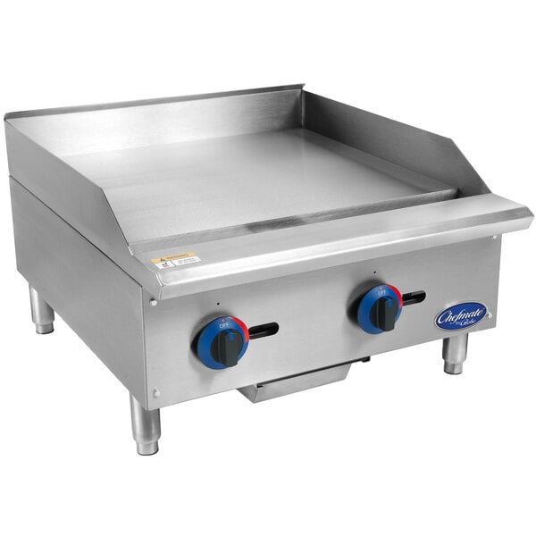 A Globe stainless steel Chefmate gas griddle on a counter.