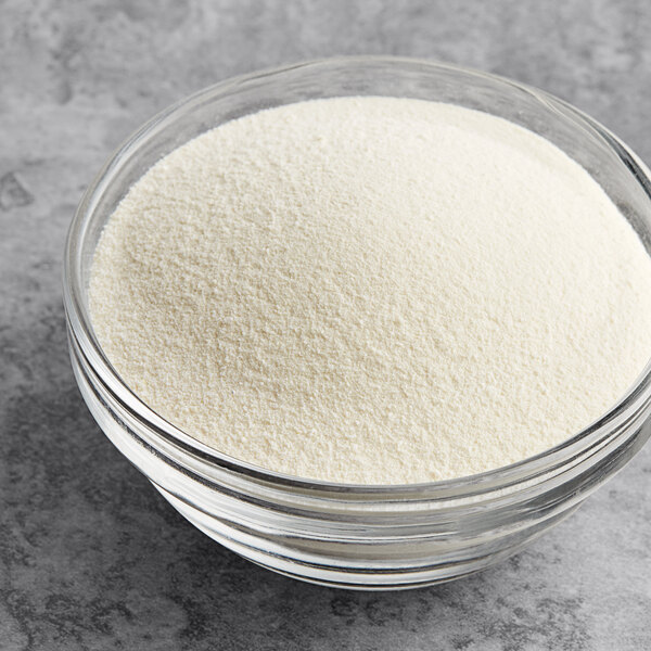 A bowl of Foothill Farms Alfredo Sauce mix powder.