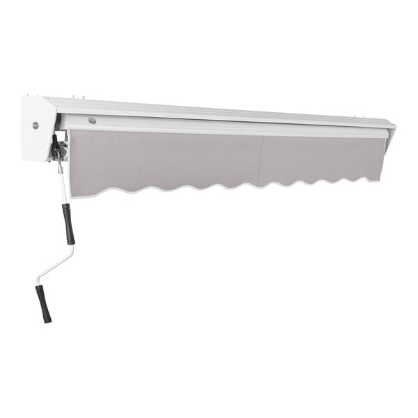 A gray Awntech retractable patio awning with a handle and a protective hood.