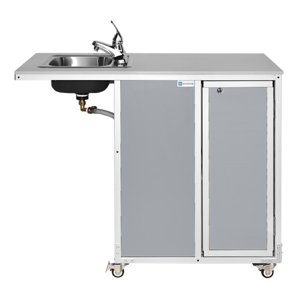 A gray wheelchair accessible portable self-contained sink with a faucet, countertop, and storage cabinet on wheels.