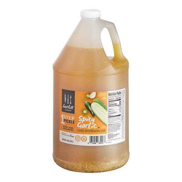 A jug of Foothill Farms Spicy Garlic Pickle Brine with a label.