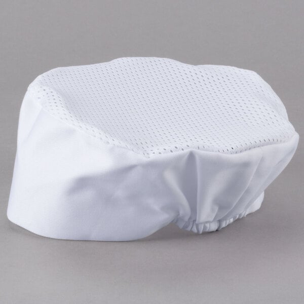 A white Chef Revival baker's skull cap with a mesh top.
