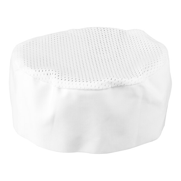 A white, round cap with a solid fabric side and a perforated mesh top.