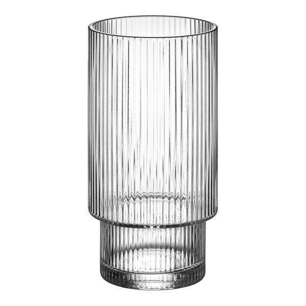 A clear glass container with a vertical ribbed design.