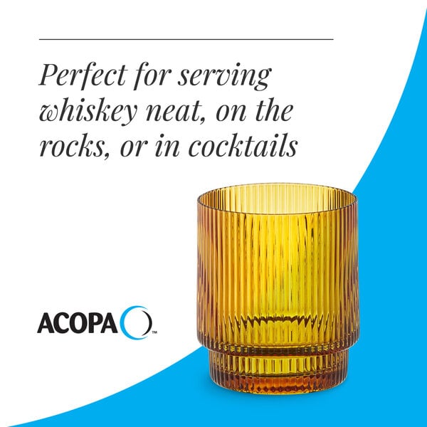 A ribbed amber glass tumbler designed for serving whiskey or cocktails.