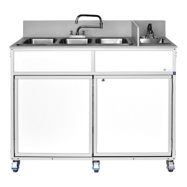 A white four-basin portable self-contained sink with a faucet and storage cabinet below.