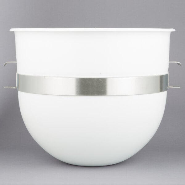 A white bowl with silver bands.