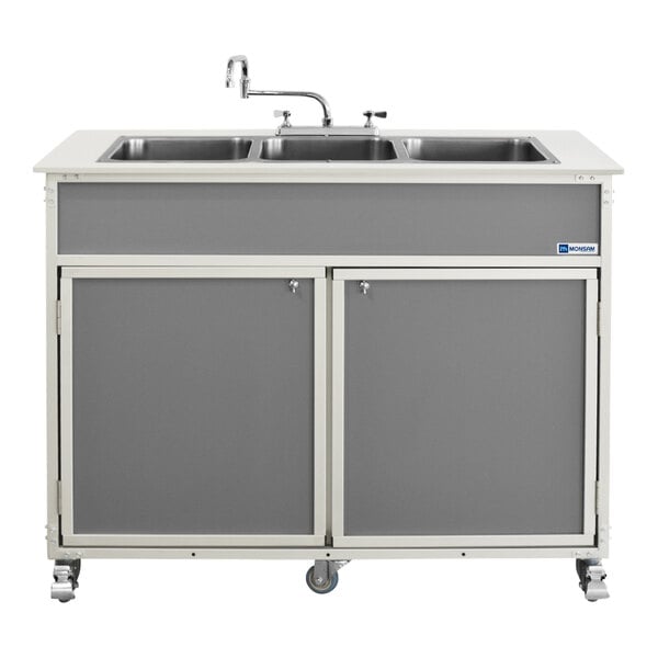 A gray Monsam portable sink with three deep basins on wheels.