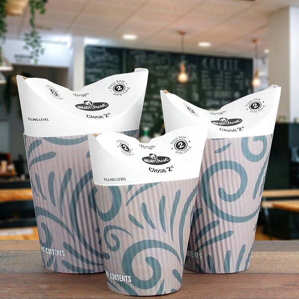 Three LK Packaging 12 oz. paper hot cups with butterfly lids on a table.