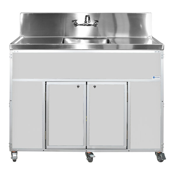 A white portable commercial sink with a single deep basin, two drainboards, and locking cabinet doors on wheels.