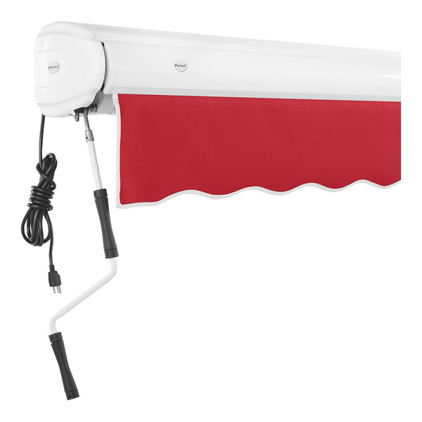 An Awntech red and white Key West retractable patio awning with a cord.