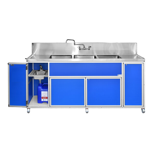 A blue portable commercial sink unit with four deep basins, two drain boards, and storage cabinets underneath.