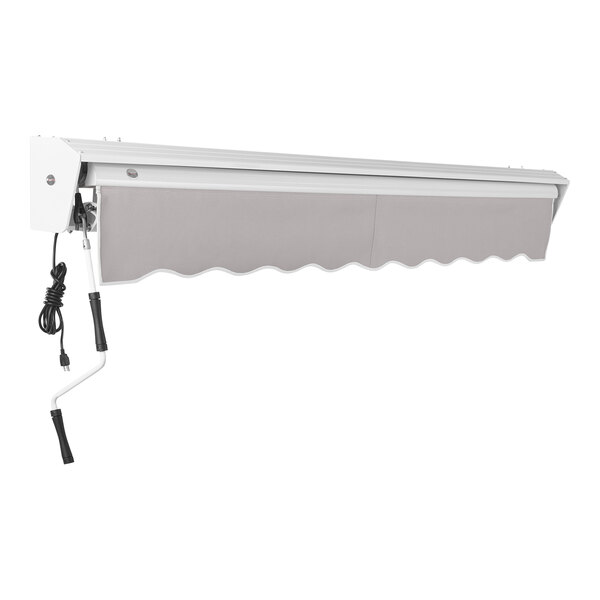 An Awntech gray retractable patio awning with a black cord.