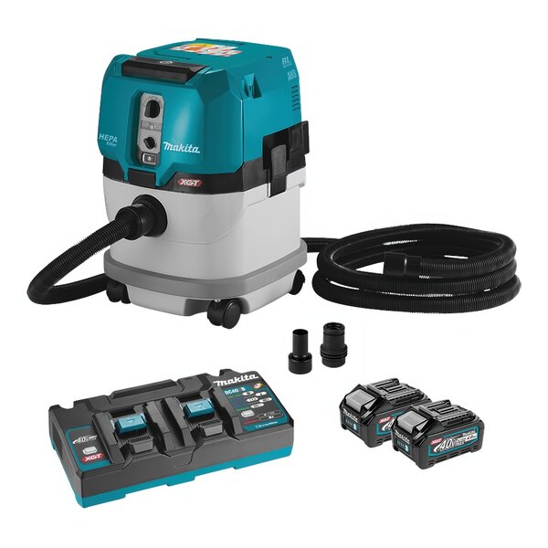A black and blue Makita cordless vacuum with battery and charger.