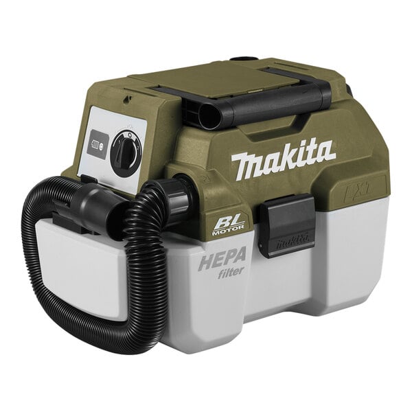 A green and black Makita cordless wet/dry vacuum.