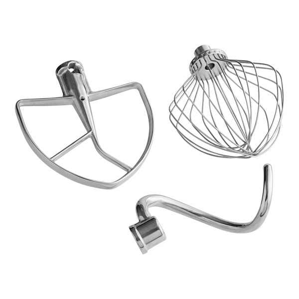 A group of KitchenAid commercial mixers with metal bowls and whisks.