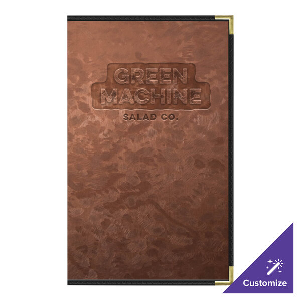A brown metallic menu cover with black borders on a table.