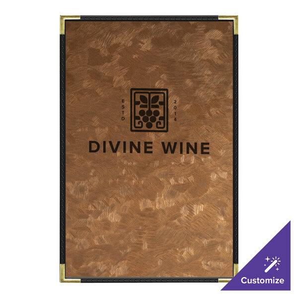 A brown brushed metallic menu cover with black text on a table in a fine dining restaurant.