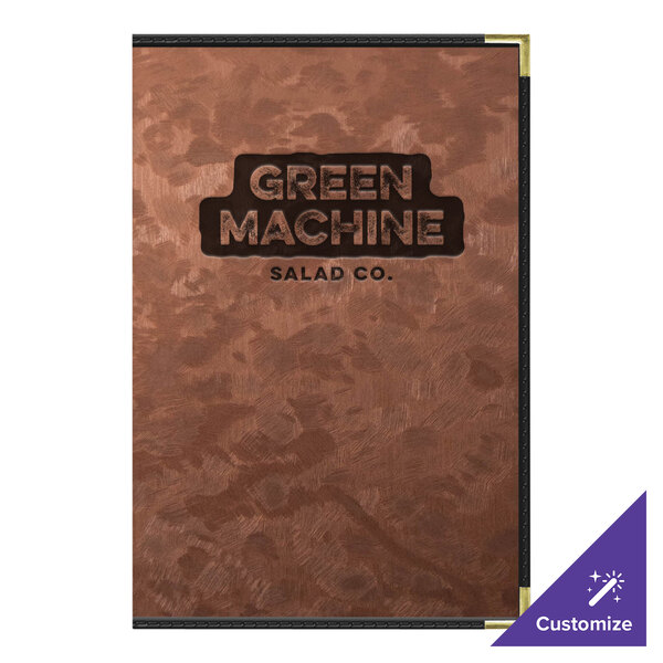 A bronze metallic menu cover with 6 views on a restaurant table.