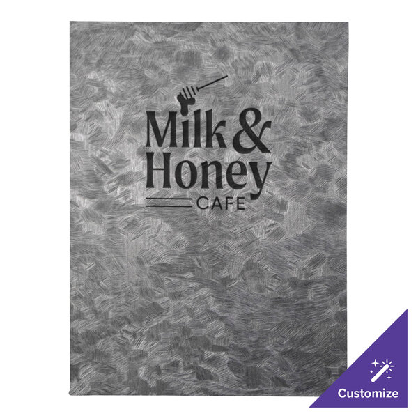 A H. Risch, Inc. steel brushed metallic menu cover on a table in a brunch café.