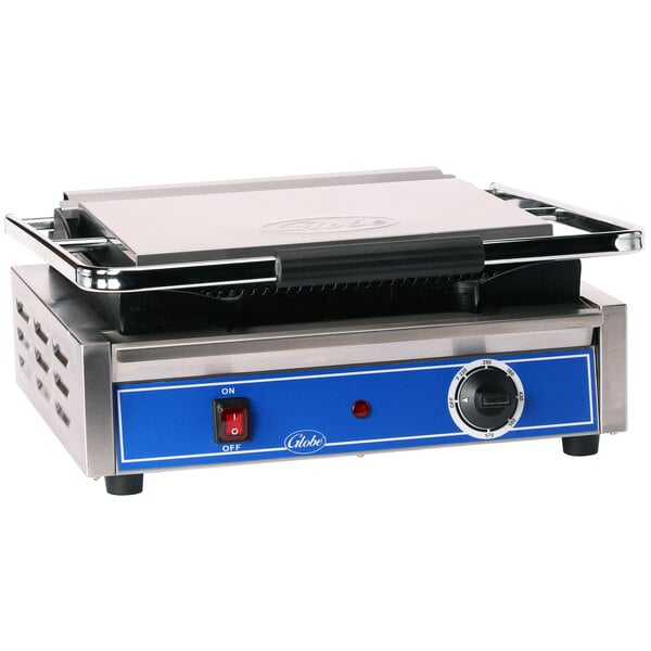 A blue and silver Globe Panini Sandwich Grill on a counter.
