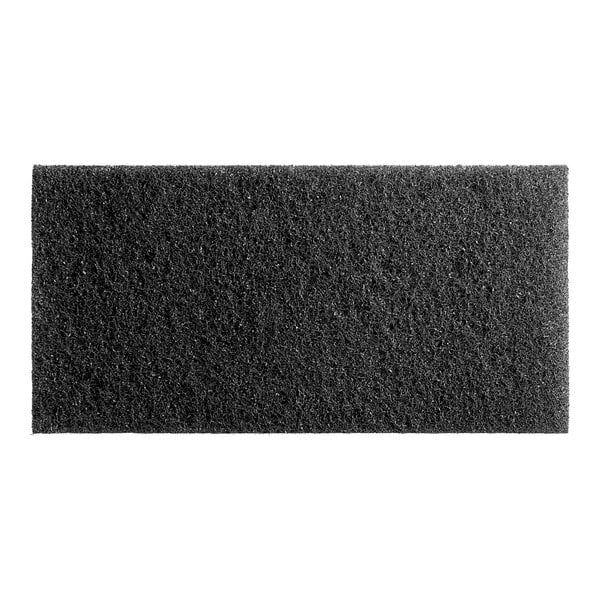 A close-up of a black rectangular Lavex stripping pad.