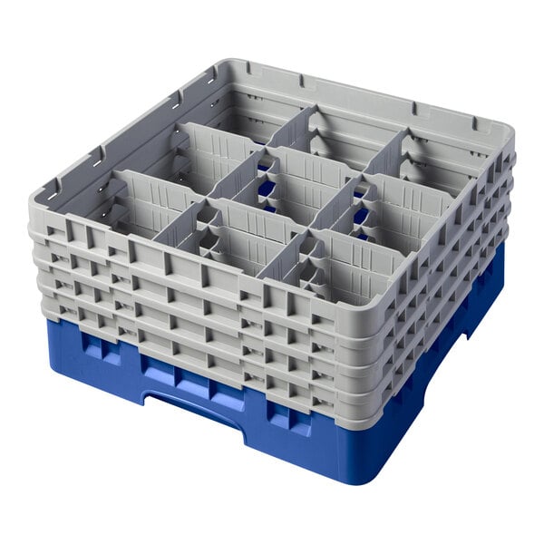 A blue plastic Cambro glass rack with nine compartments.