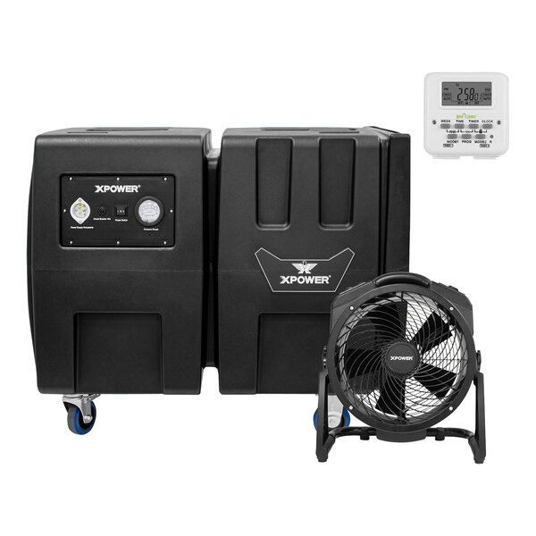 A close-up of a white XPOWER machine with a screen and a fan.